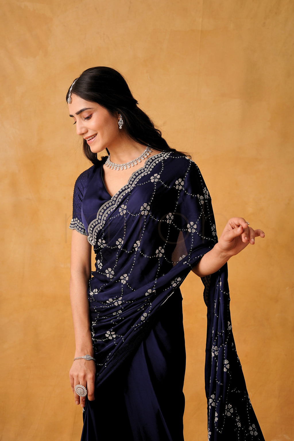 Regal Navy Blue Satin Saree with Majestic Silver Stone Embellishments