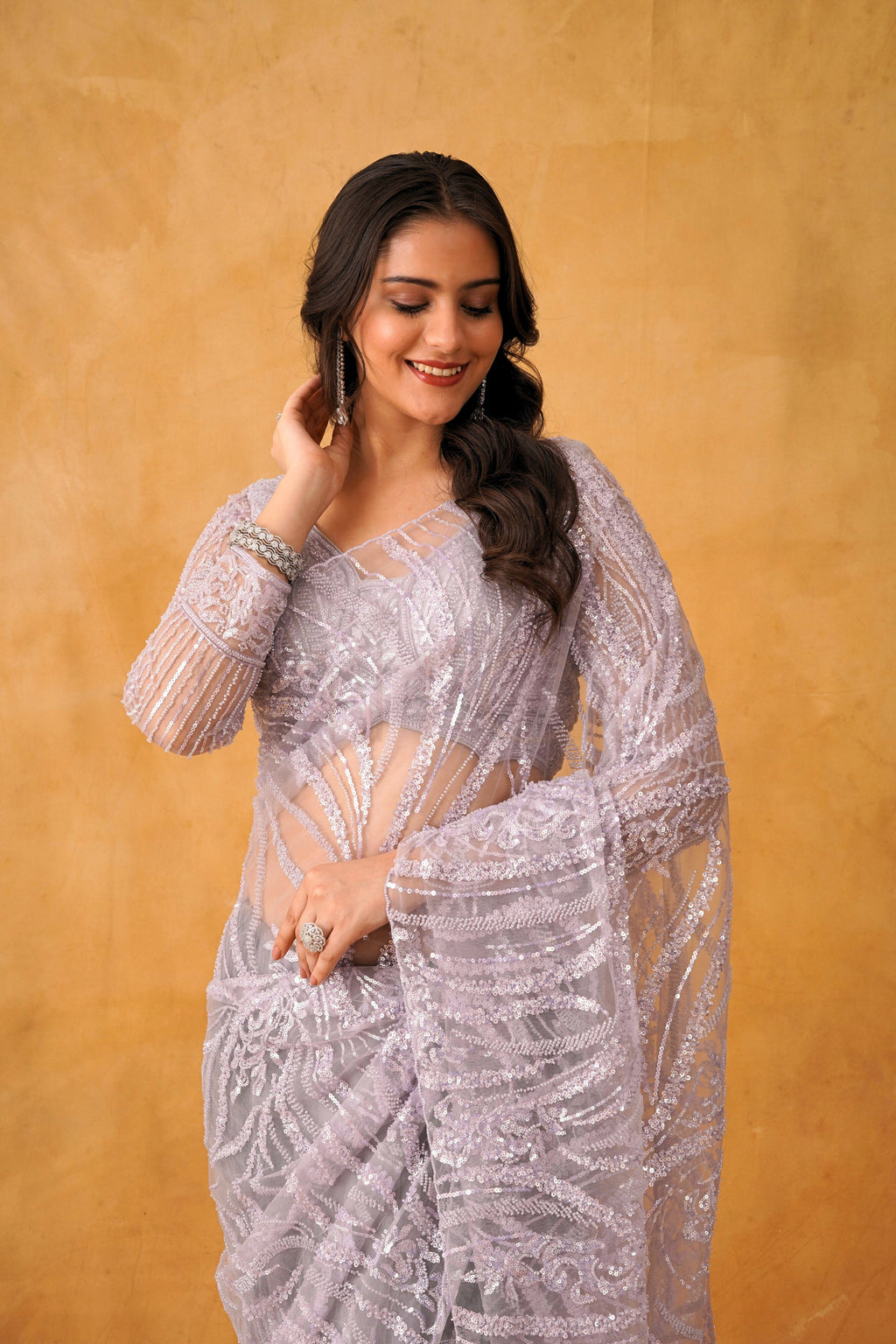 Lavender Gleam Net Saree with Intricate Sequin Detailing