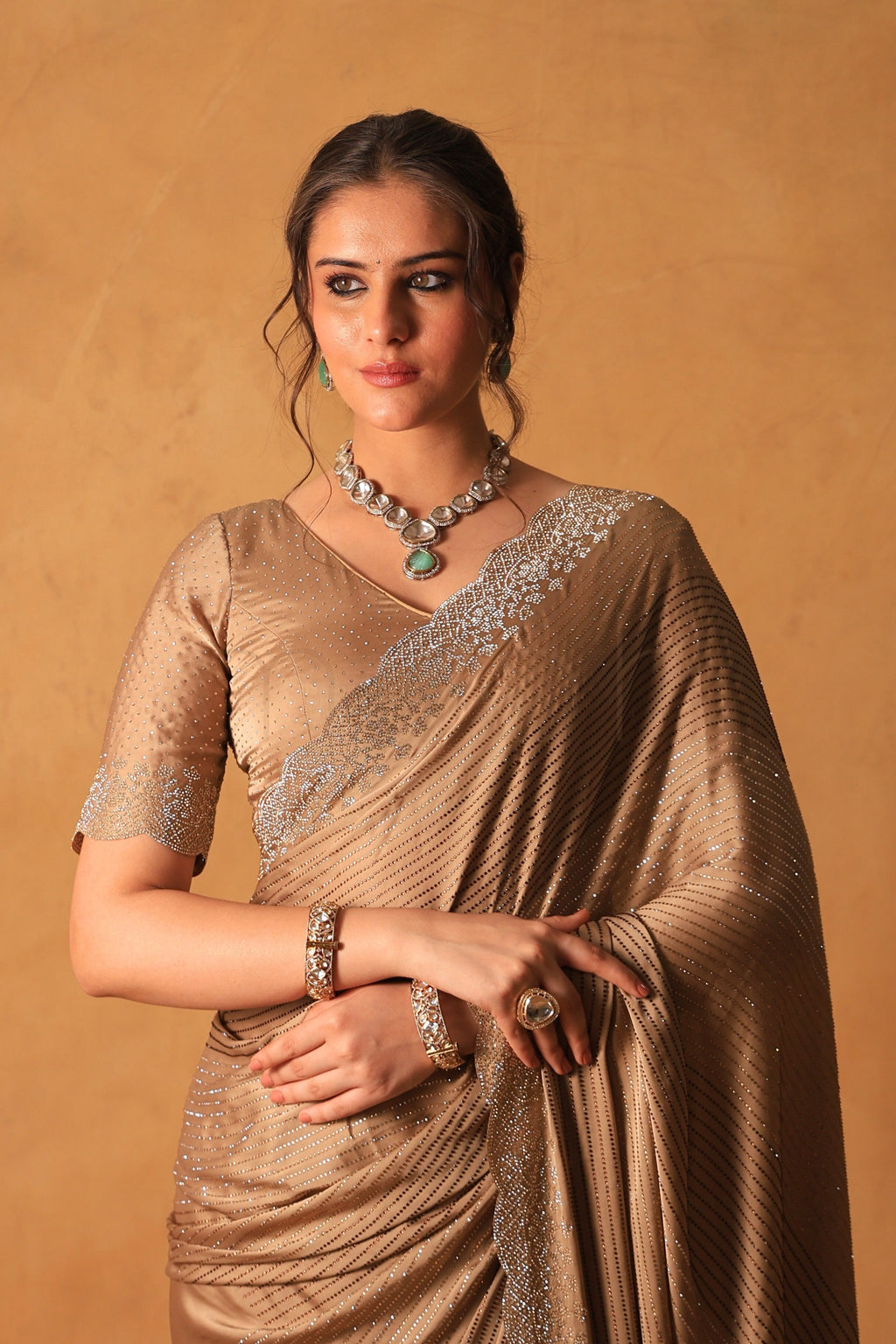 Chikoo Gold Satin Saree with Swarovski & Jarkan Stone Embellishments