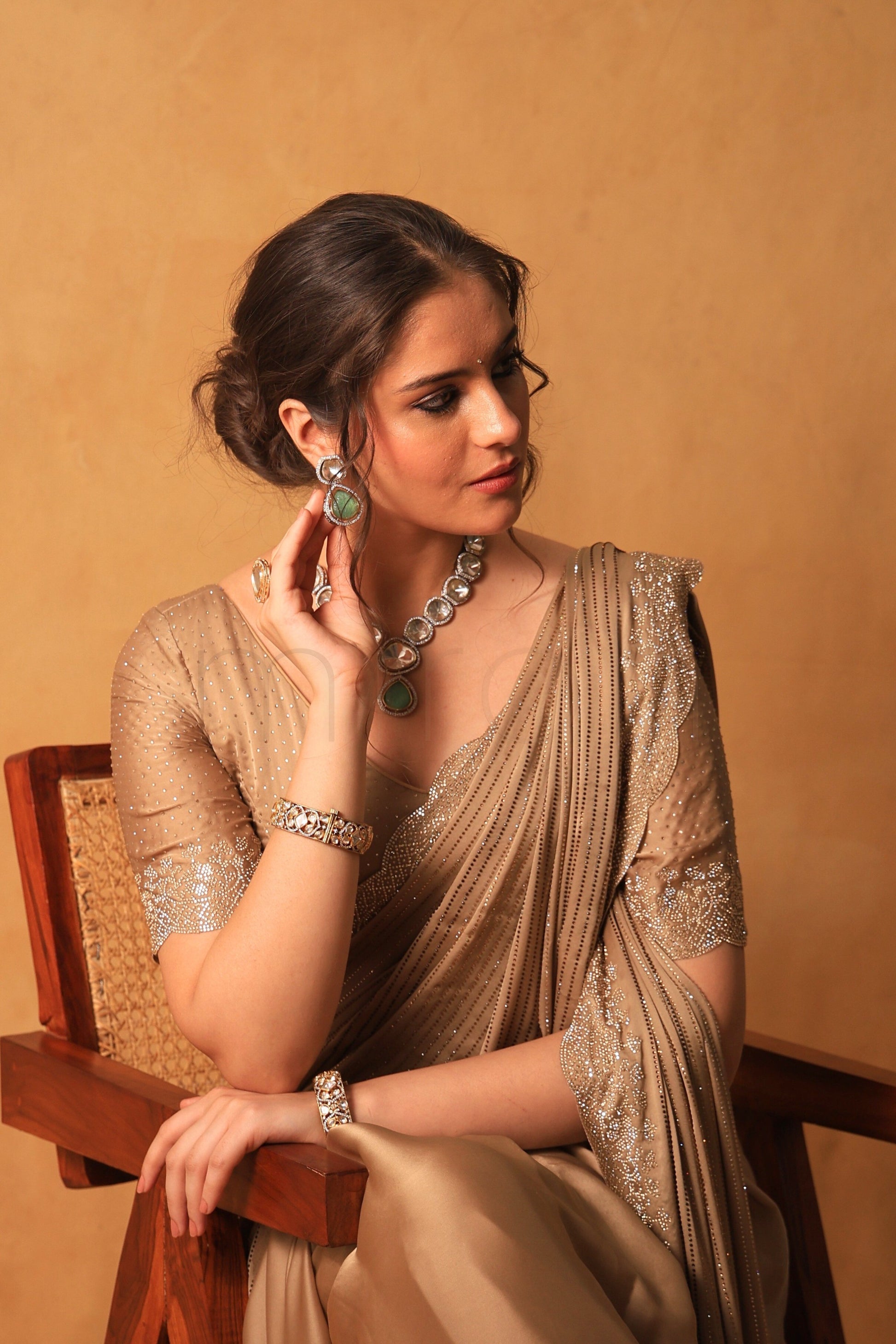 Chikoo Gold Satin Saree with Swarovski & Jarkan Stone Embellishments